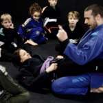 Our coach, sid, teaching the kids in our kids bjj class