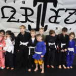 Group photo of our childrens bjj class